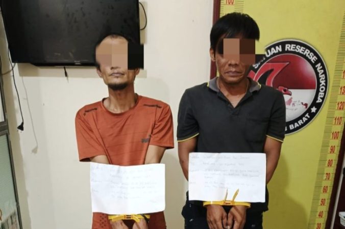 Dua Pria Diciduk di Pasar Merlung